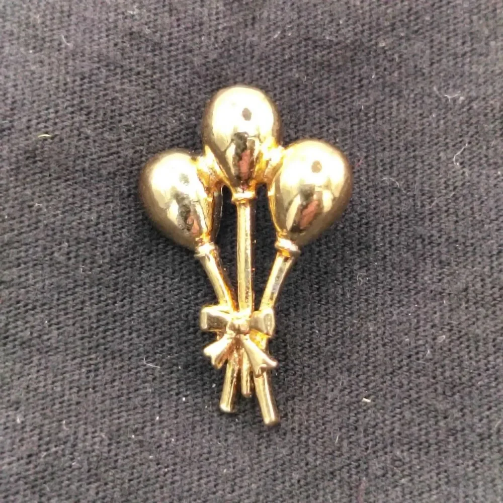 None brooch pin